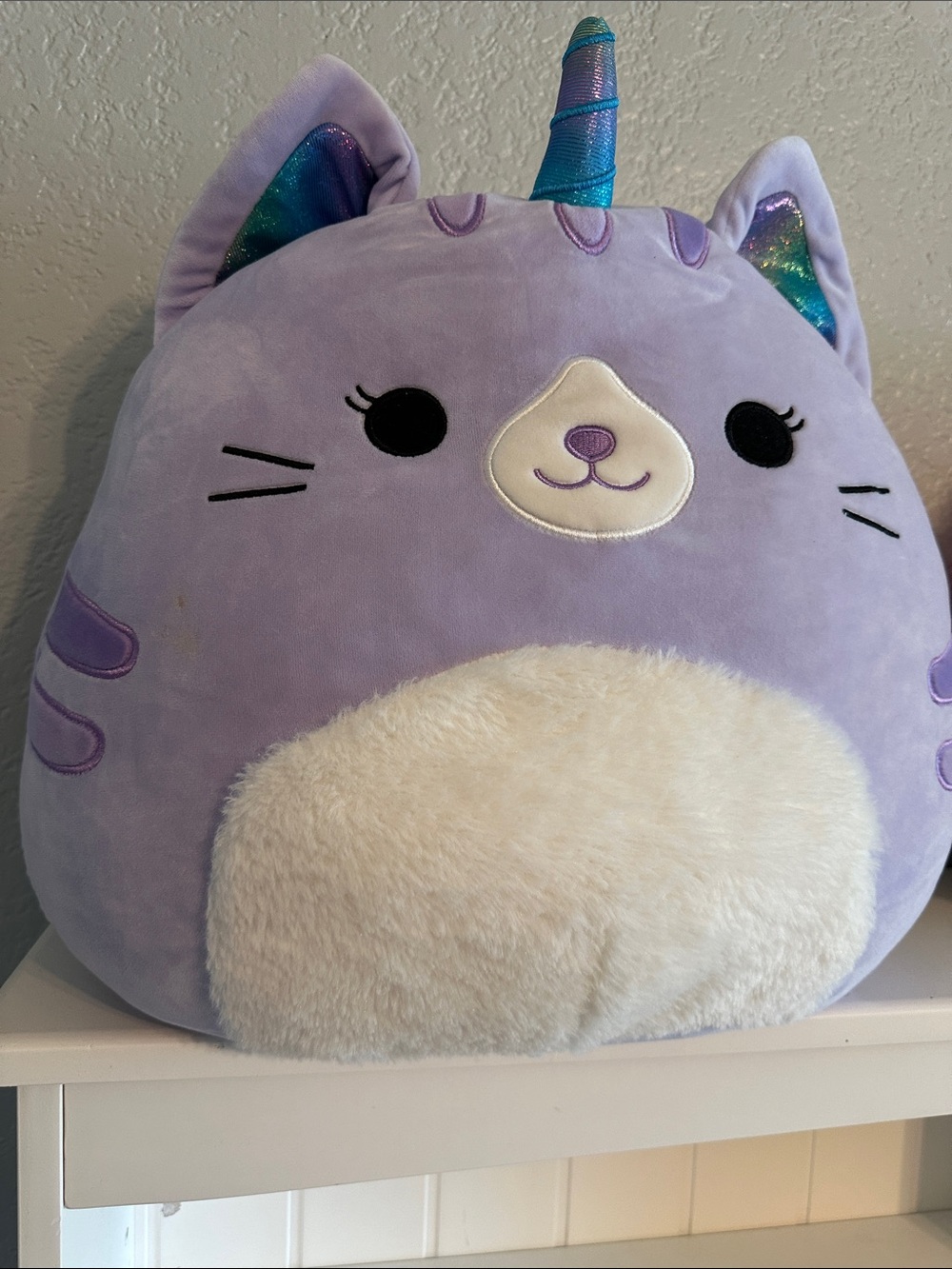 Squishmallows Lavender Unicorn Cat Plush with Cream Belly and Iridescent Horn